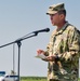 Brig. Gen. Christopher Norrie gives a closing ceremony speech