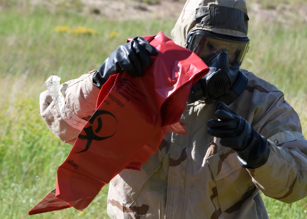 Airmen decontaminate ordnance during chemical operations exercise