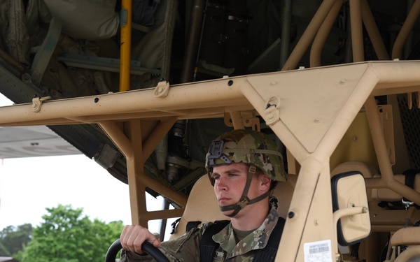 Army, Air Force Reserve work together loading C-130J