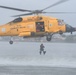 Aircrew from AIRSTA Cape Cod demonstrates Search and Rescue