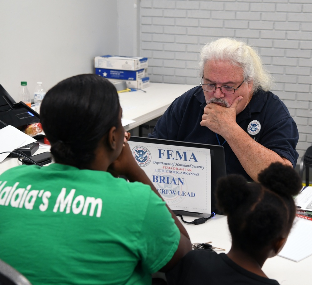 Local Residents Visit a FEMA Disaster Recovery Center