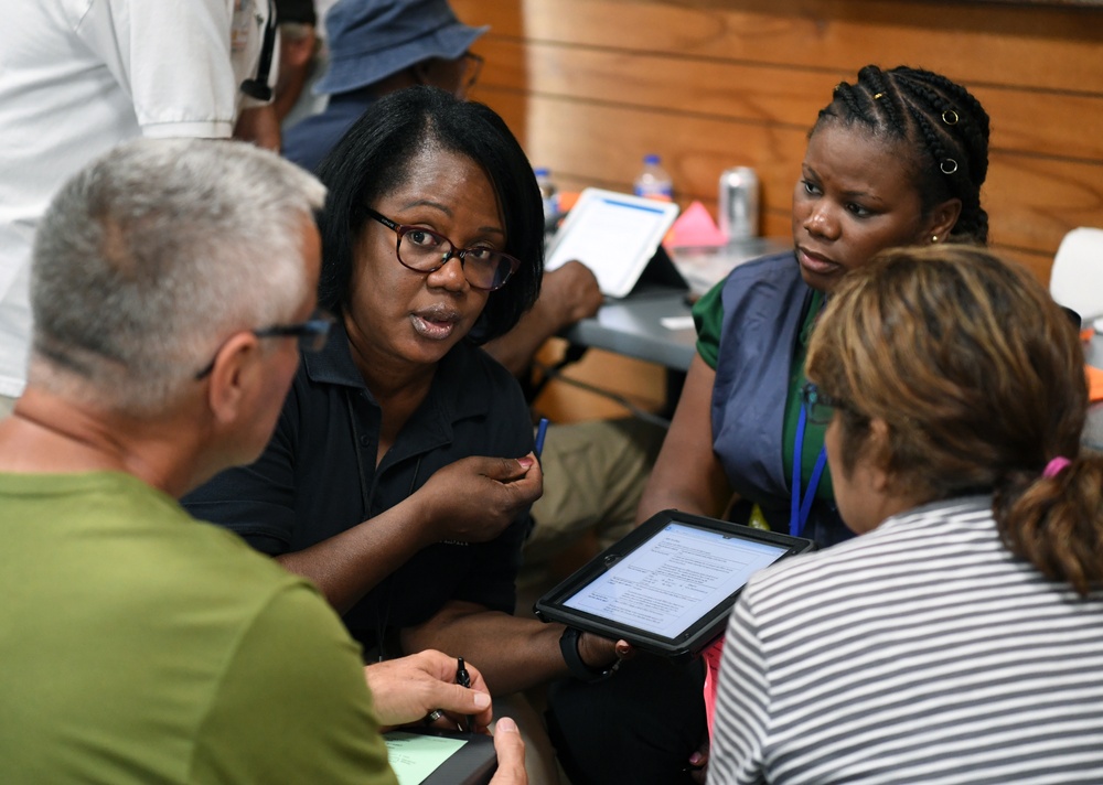 FEMA Representatives Talk to Local Residents Visit Disaster Recovery Center