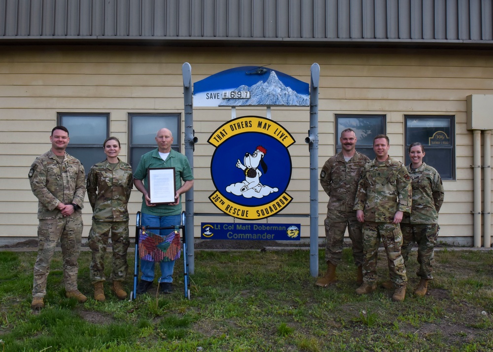 36th RQS, SERE saves snowmobilers life