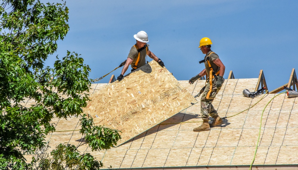 Carrying sheeting on the roof