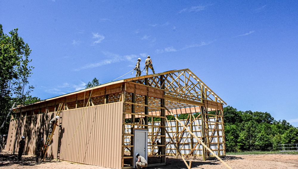 Military engineers build a pole barn