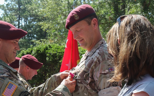 All American Division honors British Brig. Oliver Kingsbury and welcomes Brig. Nathan Sempala-Ntege as the new deputy for plans