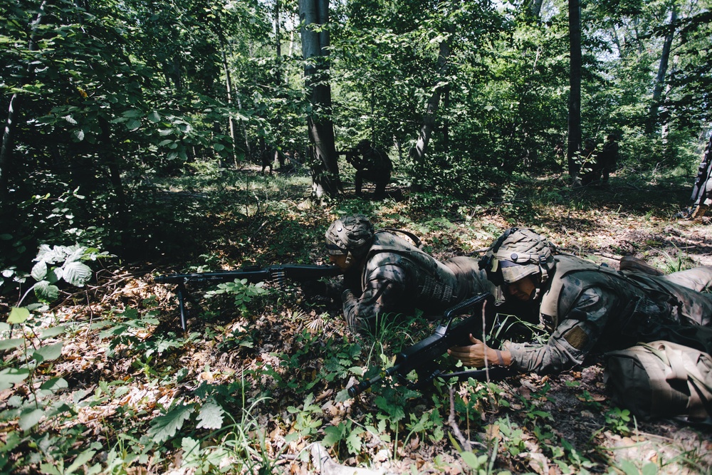 Spanish soldiers defend fighting positions