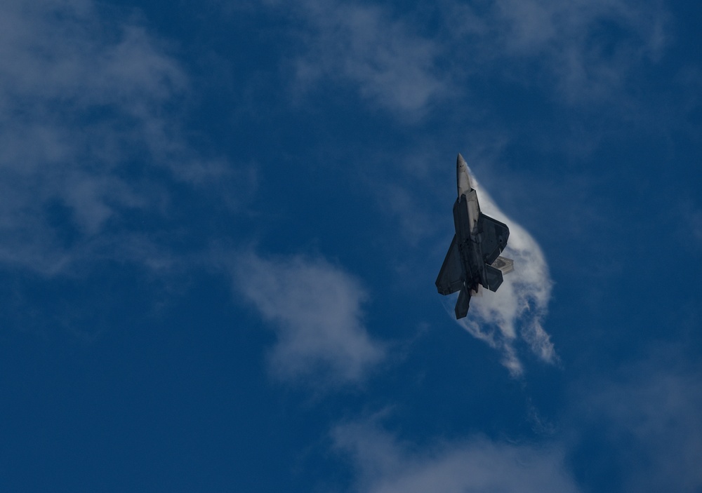 Into the cloud: F-22 performs air show maneuvers