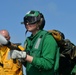 Nimitz Sailors Spray Agent During Flight Deck Drills