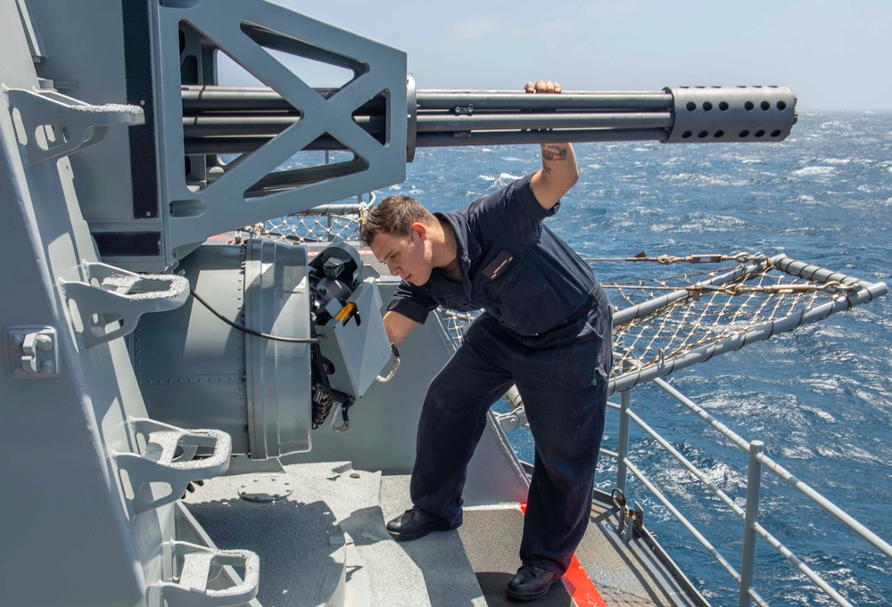 Nimitz Sailor Inspects CIWS Gun Mount