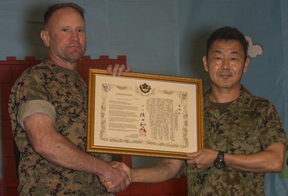 Okinawa Marine Corps commanding general is recognized by a Japan Ground Self-Defense Force general