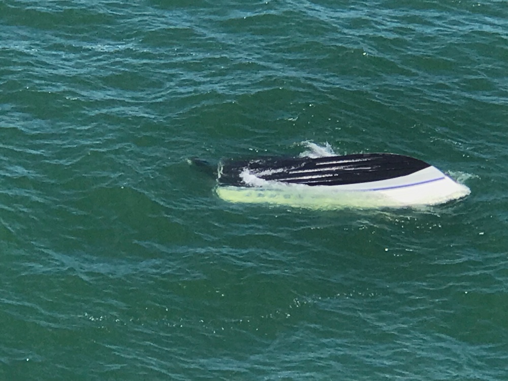 Coast Guard responds to capsized vessel