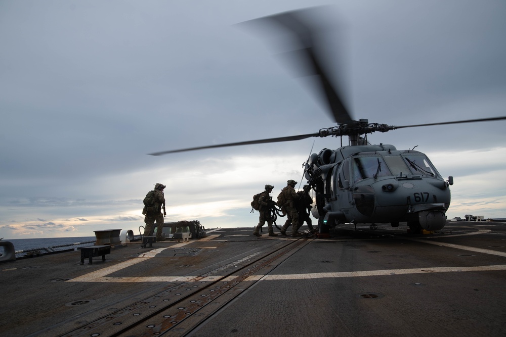 Commander Task Force 70 Conducts Helicopter Visit, Board, Search and Seizure Drills