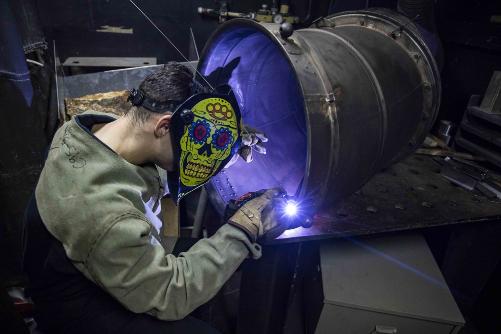 AM2 welds a crack on an exhaust pipe