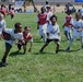 Travis youth play football with 49ers Pro athlete