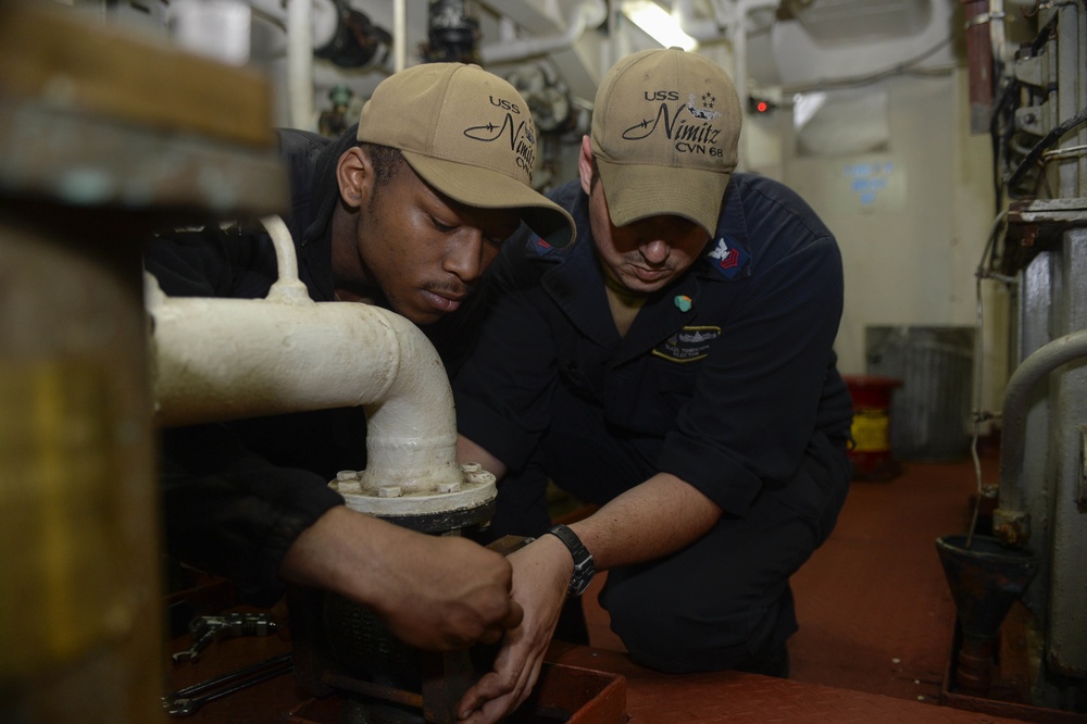 Nimitz Sailors Perform Maintenance