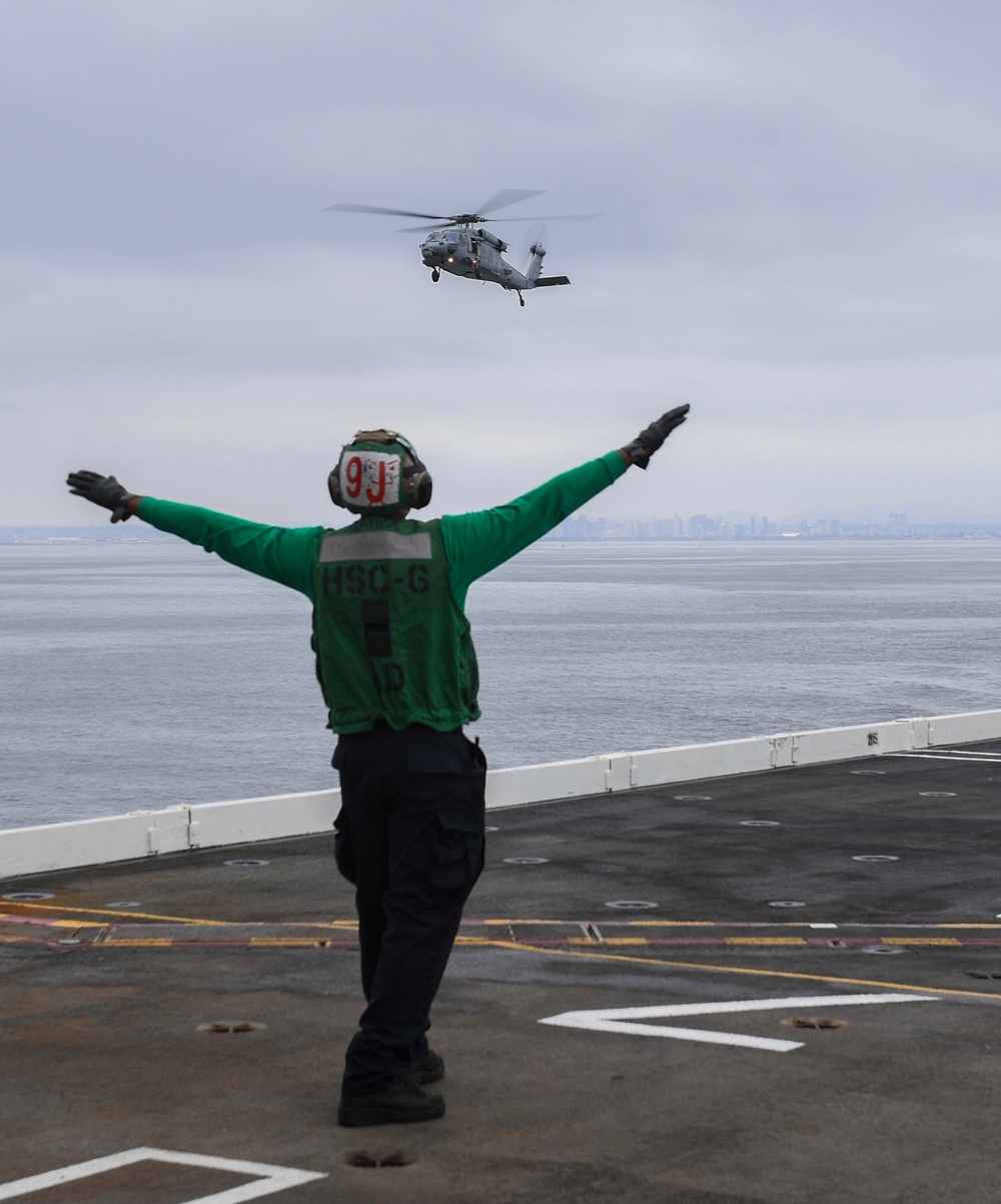 Nimitz Sailors Preform Flight Ops