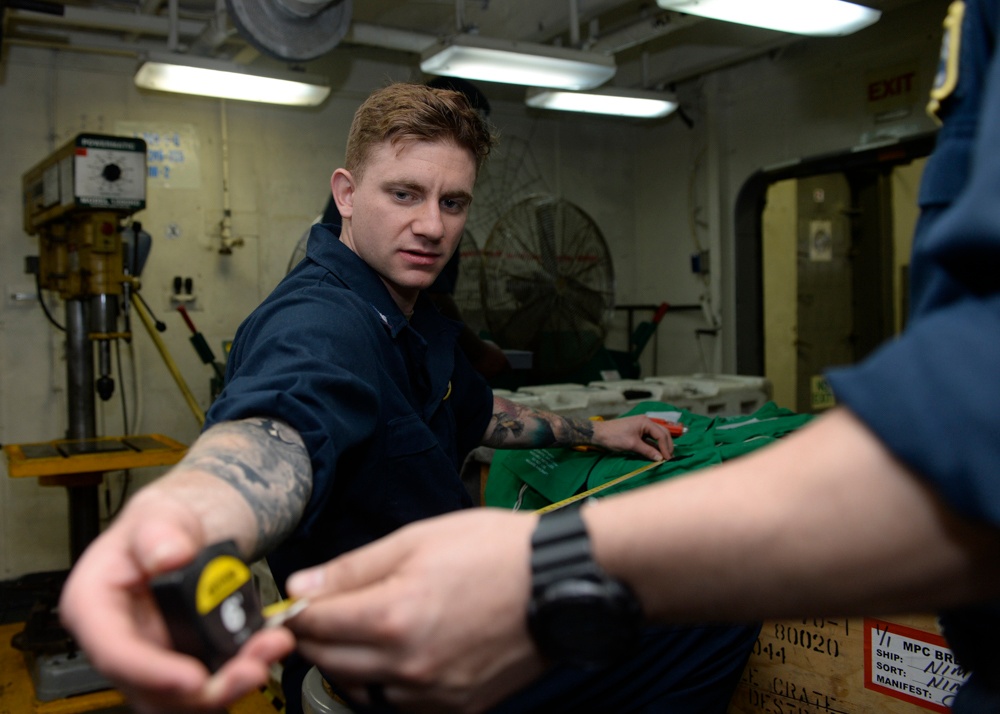 Nimitz Sailor Performs Maintenance