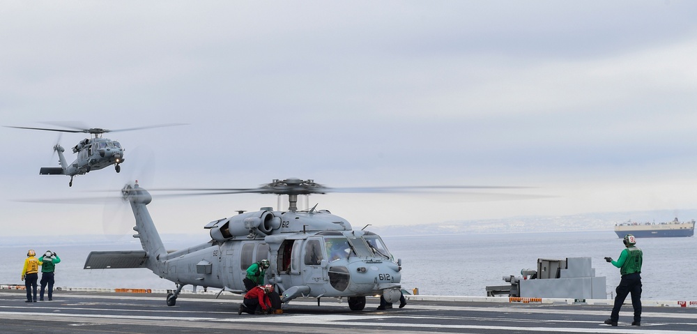 Nimitz Sailors Preform Flight Ops