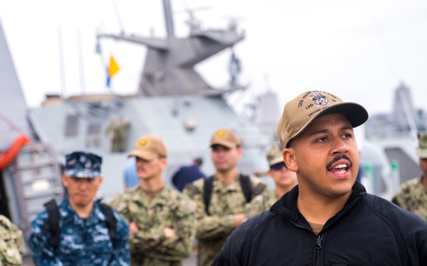 U.S. Sailors assigned to Fleet Surgical Team Three receive a pre-drill brief aboard USS New Orleans