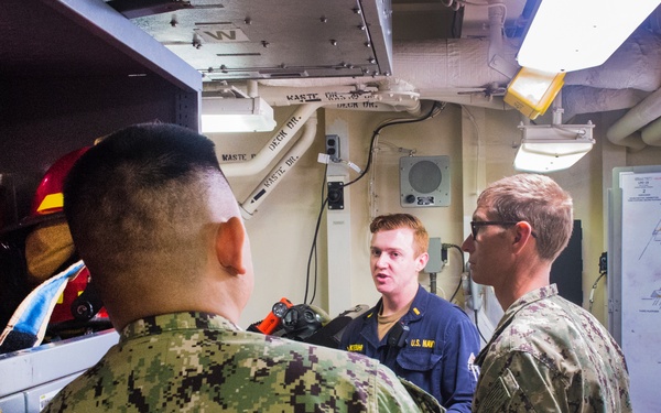 U.S. Sailors assigned to Fleet Surgical Team Three receive a pre-drill brief aboard USS New Orleans