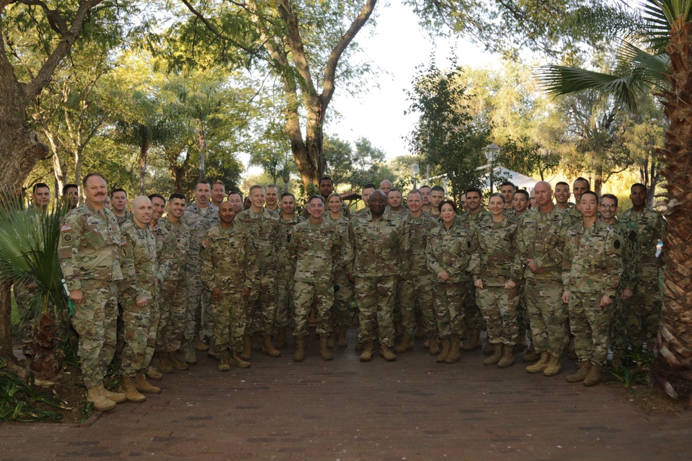 Lt. Gen. Charles Hooper, Defense Security Cooperation Agency director, speaks with the Foreign Area Officers during the African Land Forces Summit 2019 in Gaborone, Botswana, June 25, 2019