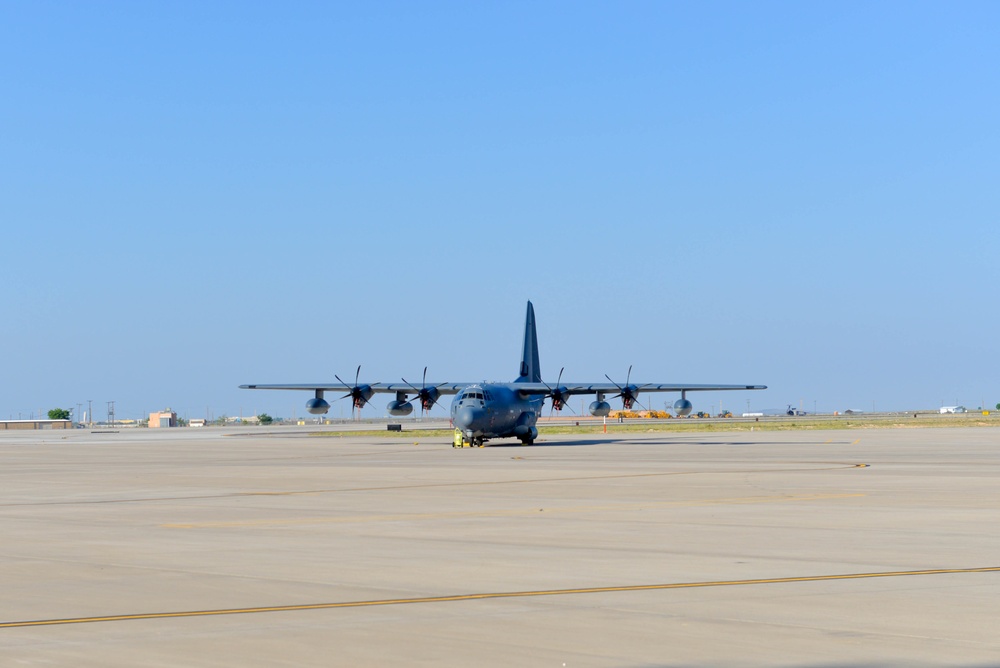 The 150th Operations Wing train with the C-130