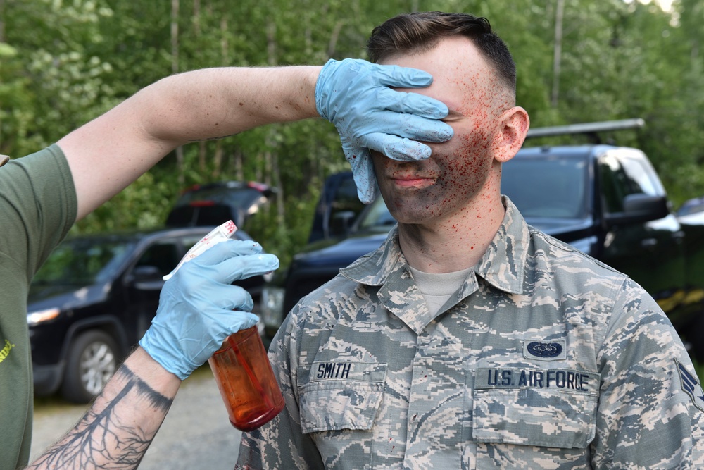 354th SFS, MDG Airmen train to save lives under fire