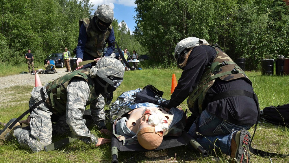 354th SFS, MDG Airmen train to save lives under fire