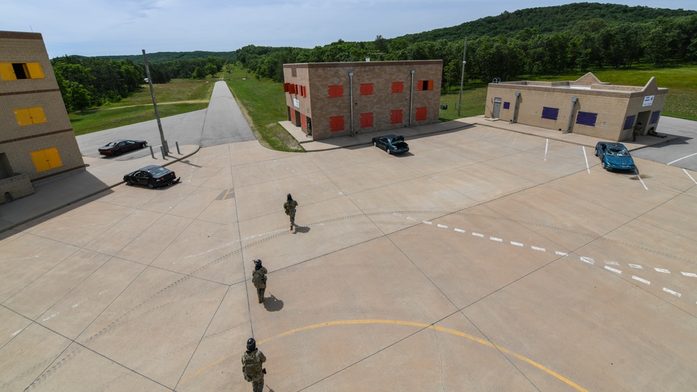 Explosive Ordnance Disposal technicians engage in force on force training