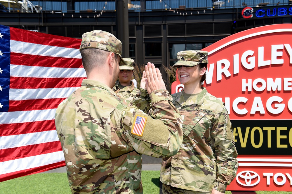 Chicago Army Reserve Soldier re-enlists at her favorite sports team field