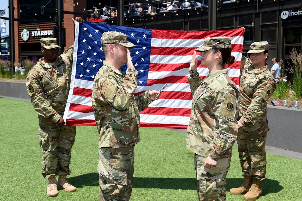 Chicago Army Reserve Soldier re-enlists at her favorite sports team field