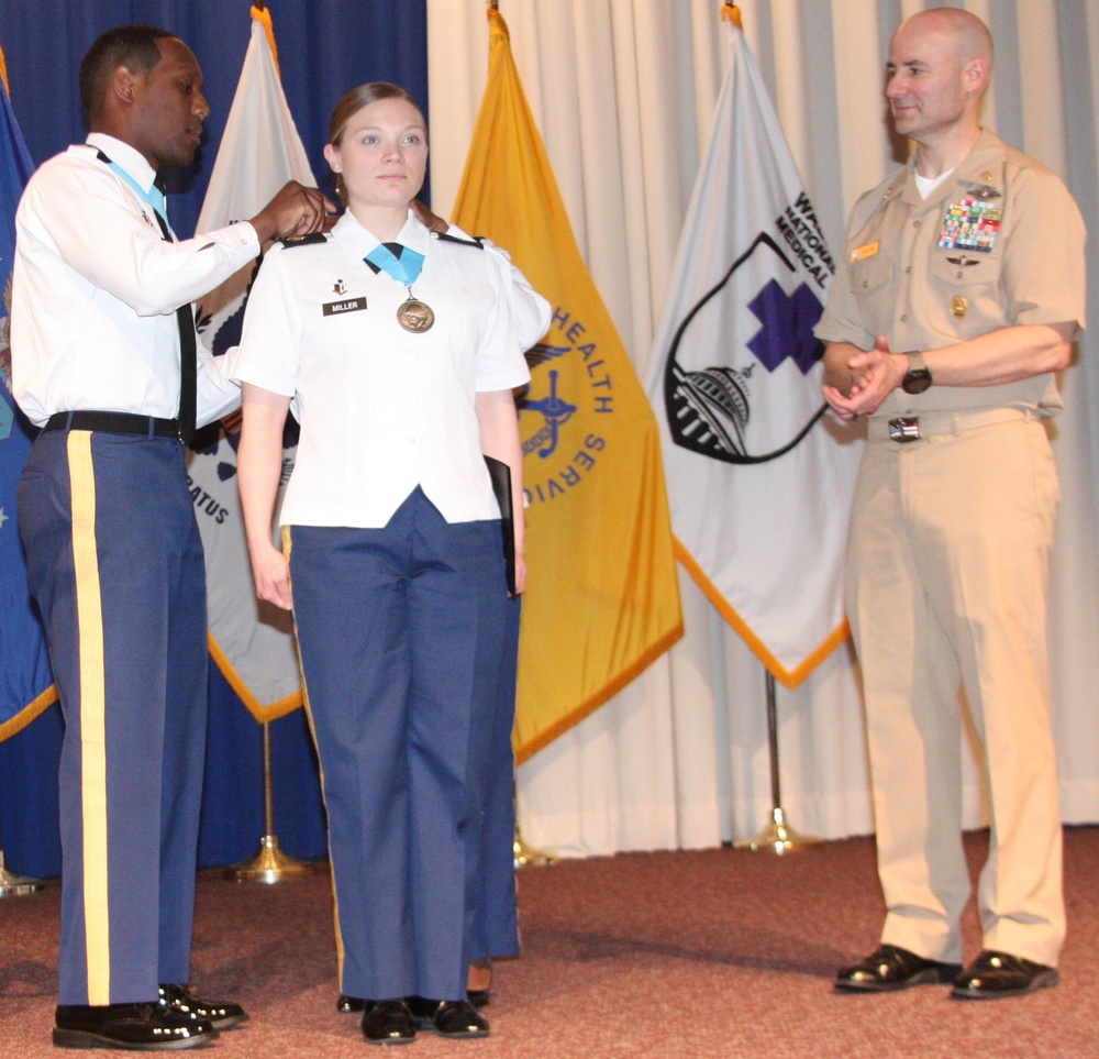 Army Staff Sgt. Jordan Miller is inducted into the Sgt. Audie Murphy Club at a ceremony at Walter Reed Bethesda