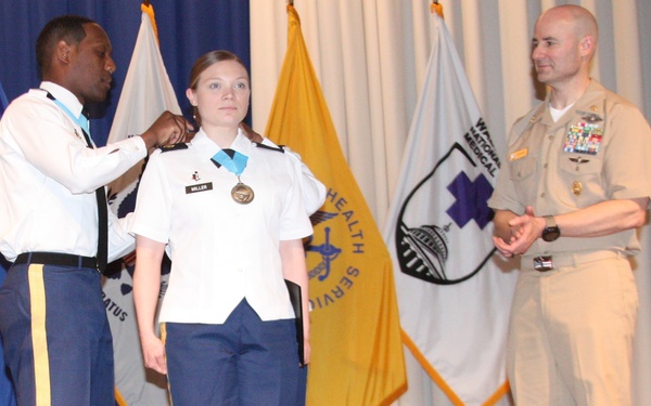 Army Staff Sgt. Jordan Miller is inducted into the Sgt. Audie Murphy Club at a ceremony at Walter Reed Bethesda
