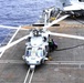 Nimitz Sailors Fuel an MH-60S Sea Hawk