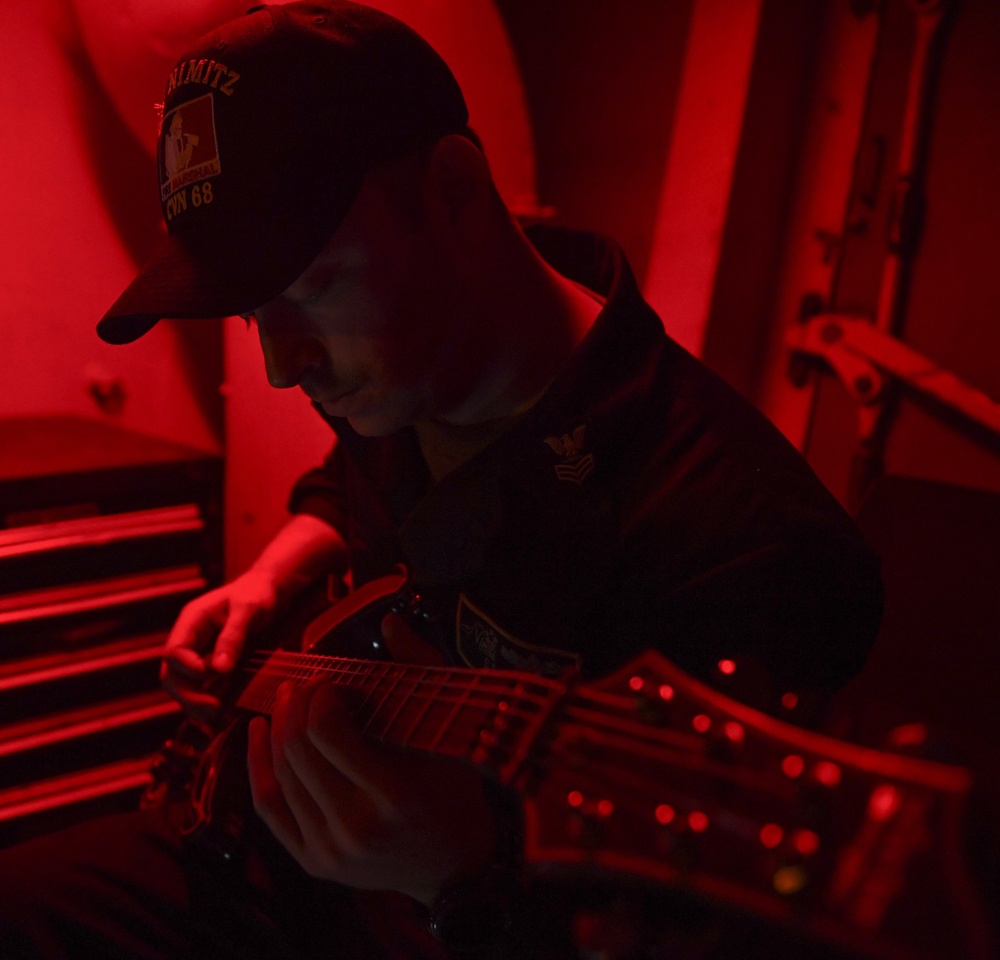 Nimitz Sailor Plays Guitar