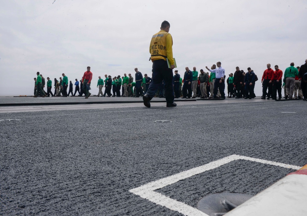 Nimitz Sailors Participate In a FOD Walkdown