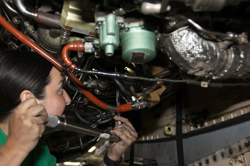 Sailor Conducts Maintenance On F/A18 Super Hornet