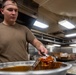 Sailor Cooks Aboard USS Harpers Ferry