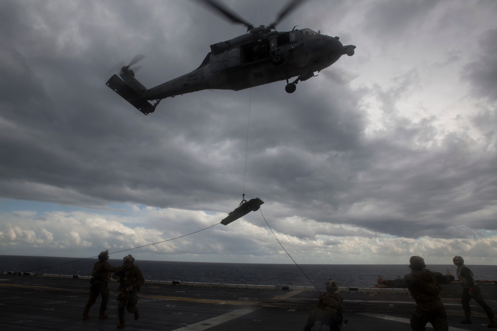 31st MEU Maritime Raid Force Marines sharpen fast roping skills aboard USS Wasp