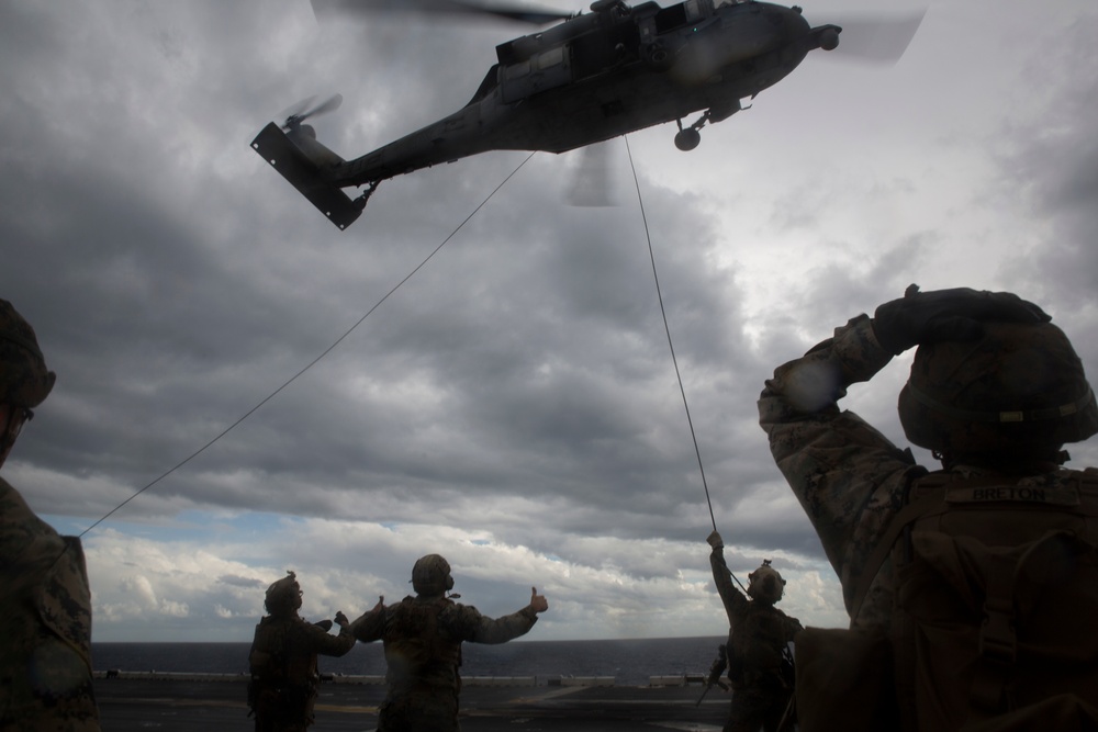 31st MEU Maritime Raid Force Marines sharpen fast roping skills aboard USS Wasp