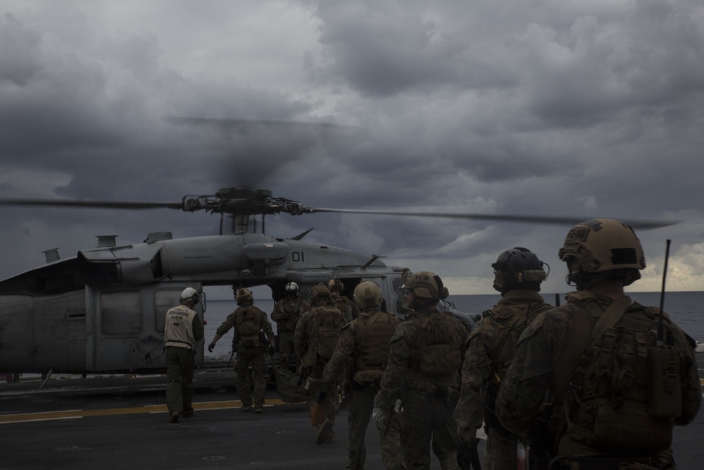 31st MEU Maritime Raid Force Marines sharpen fast roping skills aboard USS Wasp