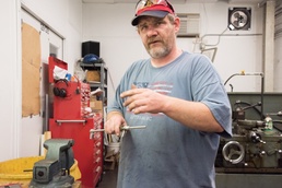 Carderock technician lends a hand during the submarine races