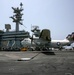A C-2A Greyhound lands on the flight deck of the Nimitz-class aircraft carrier USS Abraham Lincoln (CVN 72)