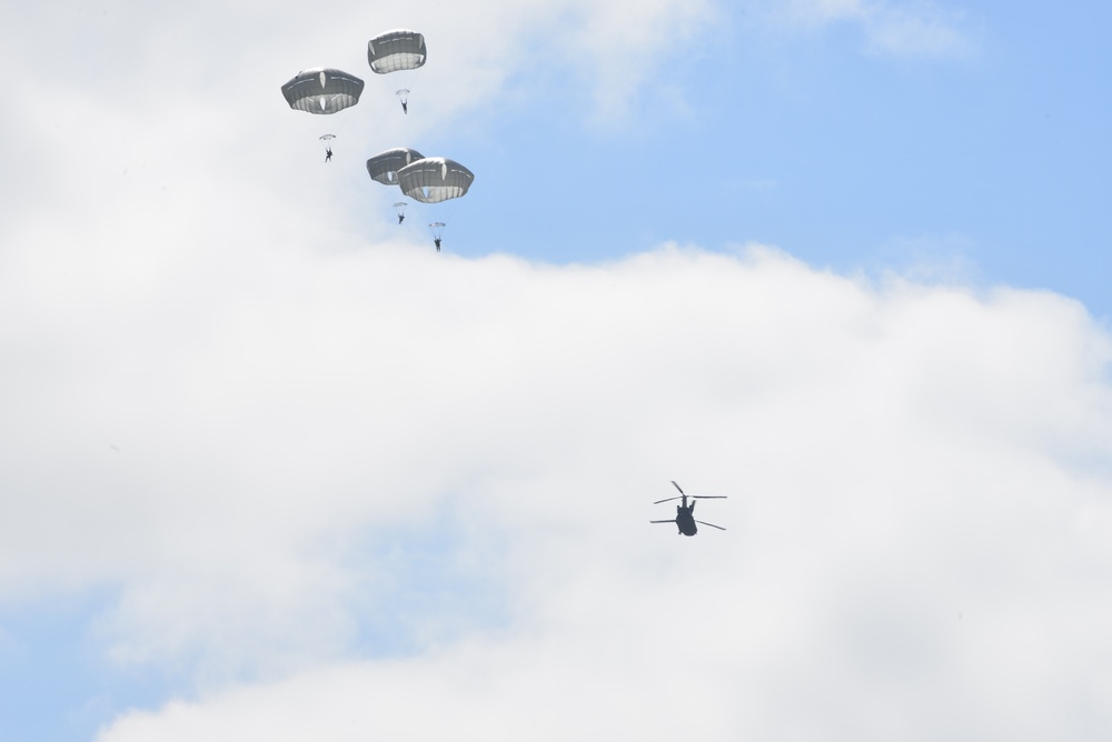 25th Infantry Division jump from a CH-47 Chinook helicopter during airborne training