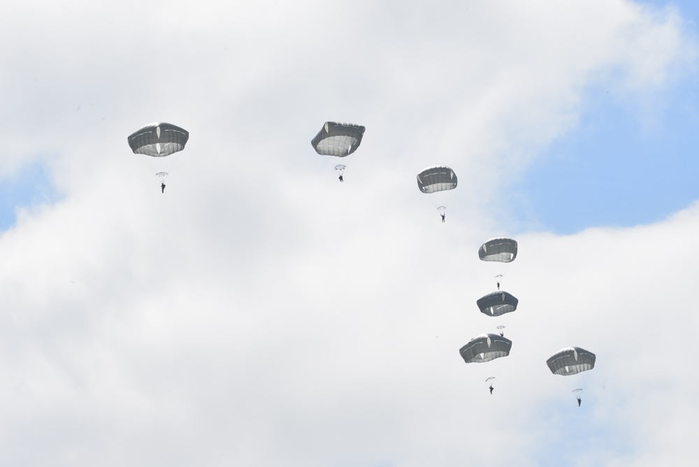 25th Infantry Division jump from a CH-47 Chinook helicopter during airborne training