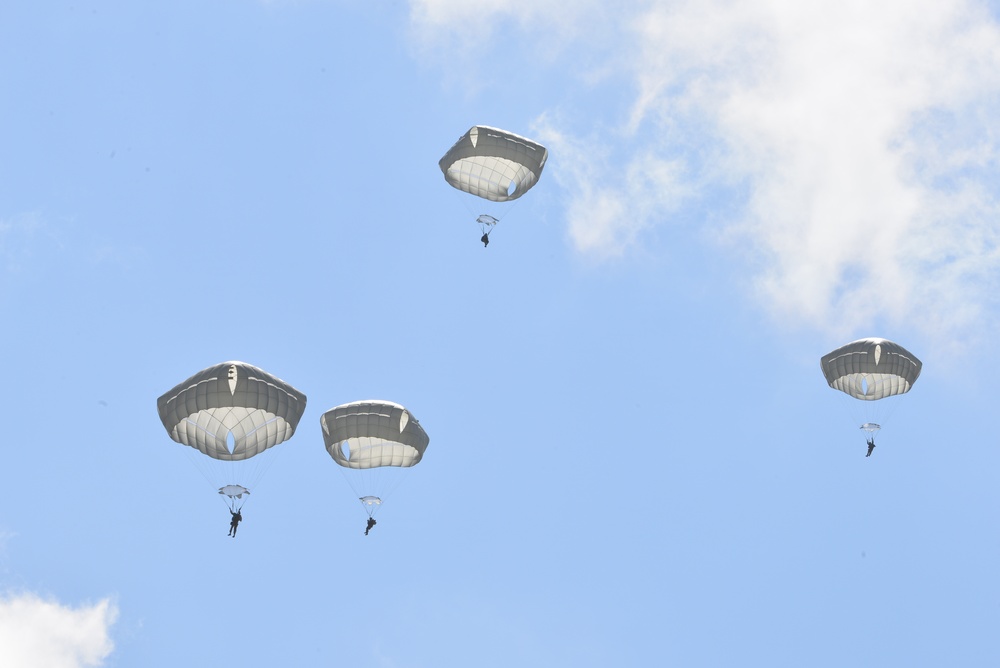 25th Infantry Division jump from a CH-47 Chinook helicopter during airborne training