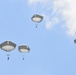 25th Infantry Division jump from a CH-47 Chinook helicopter during airborne training