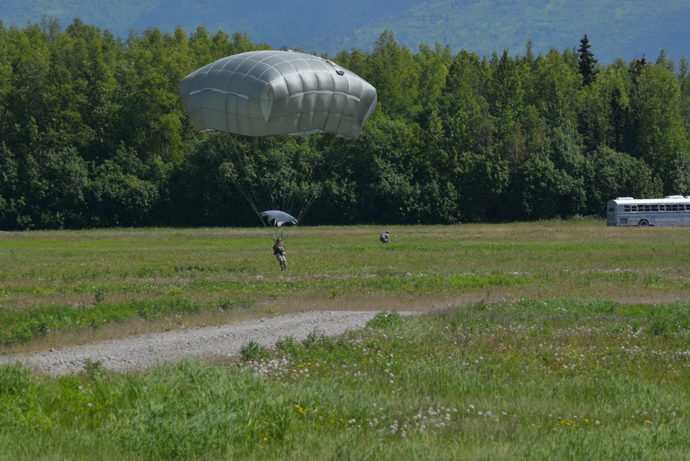 25th Infantry Division jump from a CH-47 Chinook helicopter during airborne training