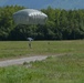 25th Infantry Division jump from a CH-47 Chinook helicopter during airborne training